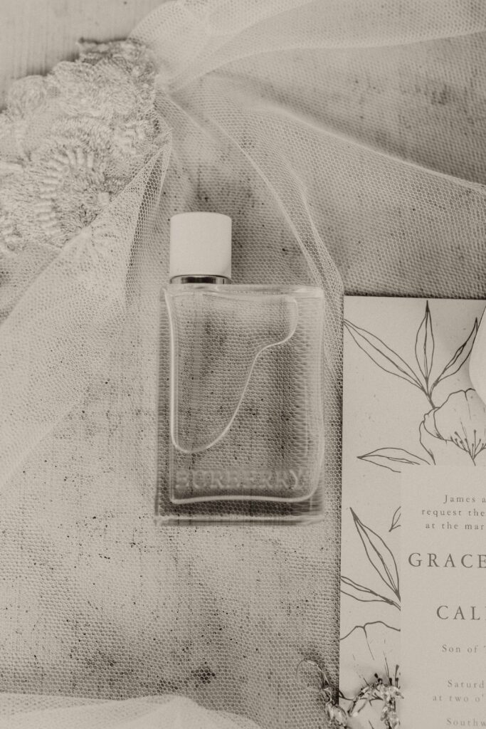 Burberry perfume staged on top of a vintage veil.