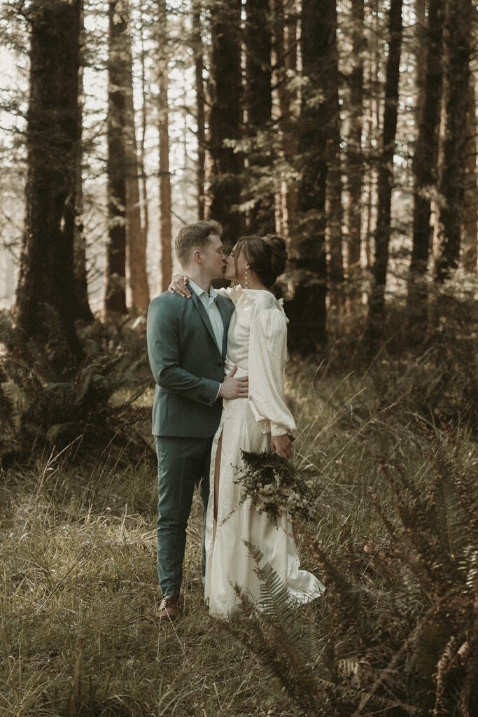 Bride and groom portraits among towering trees during their dreamy Crook Point elopement in Oregon.