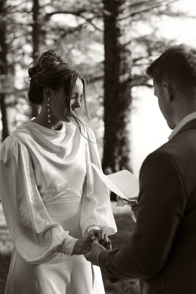 Bride and groom recite vows to one another during their dreamy Crook Point elopement in Oregon.