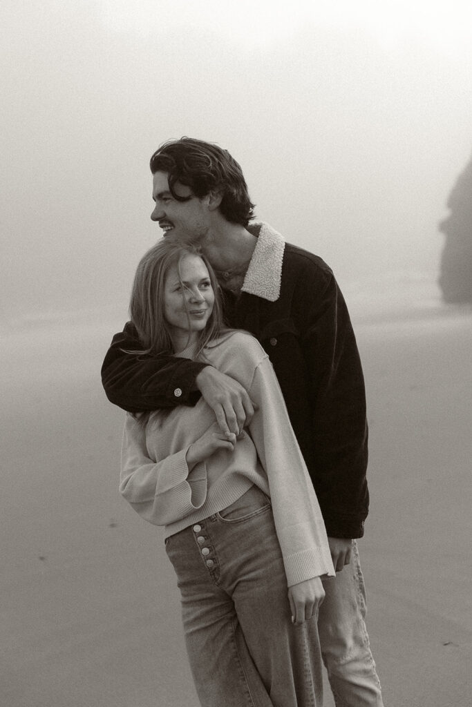 Young couple explores Gold Beach, Oregon.