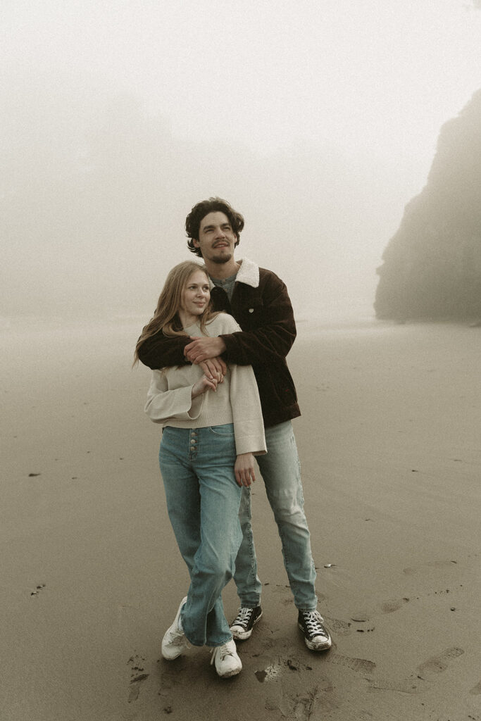Young couple explores Gold Beach, Oregon.