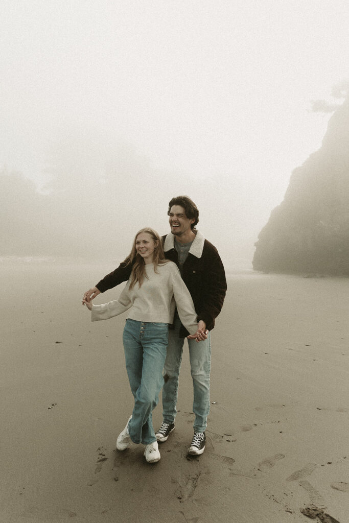 Young couple explores Gold Beach, Oregon.