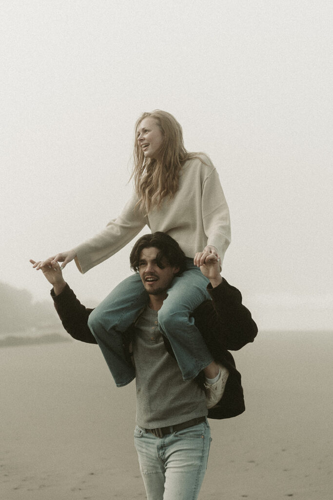 Young couple explores Gold Beach, Oregon.
