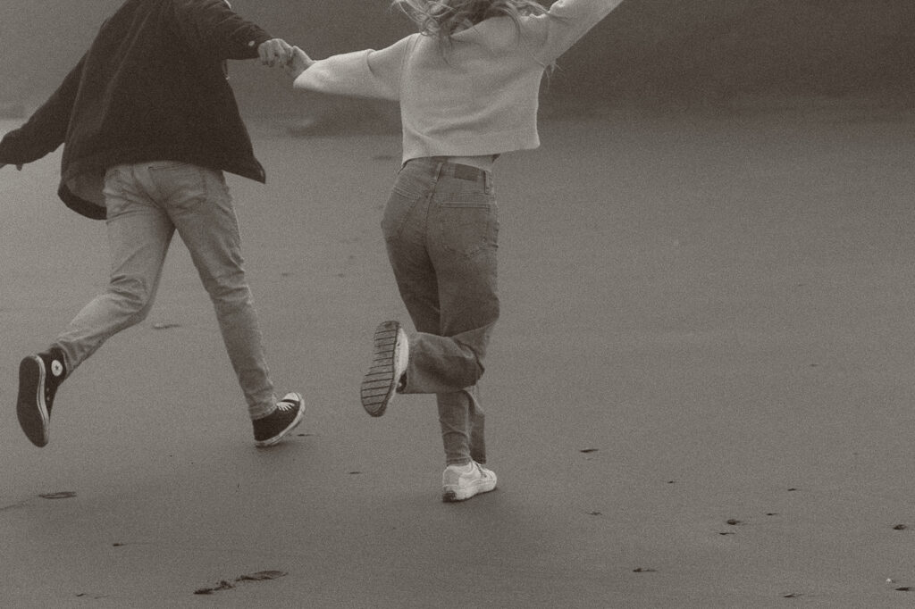 Young couple explores Gold Beach, Oregon.
