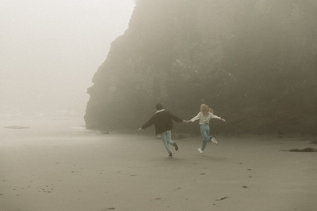 Young couple explores Gold Beach, Oregon.