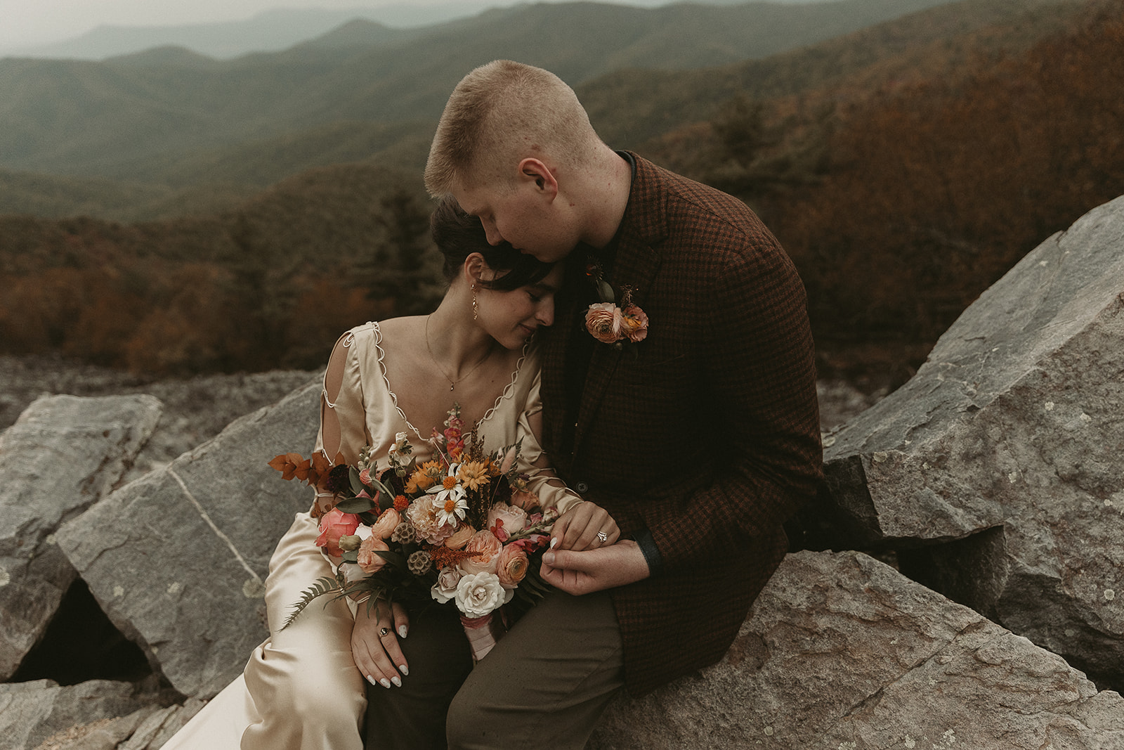 Bride and Groom cuddle in for some photos at Black Rock Summit, Virginia, for their elopement.