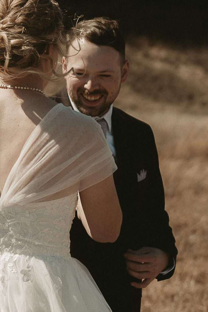 Spring micro wedding at Blue Springs Lake, Missouri. Groom's first look.